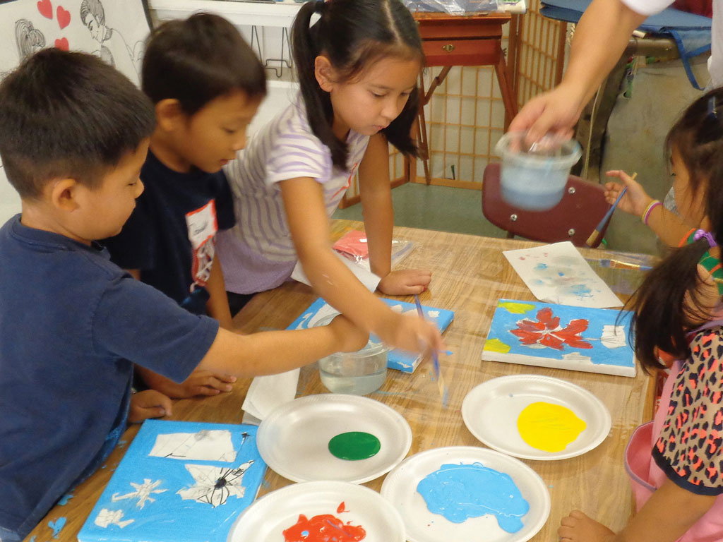 kids painting in art class