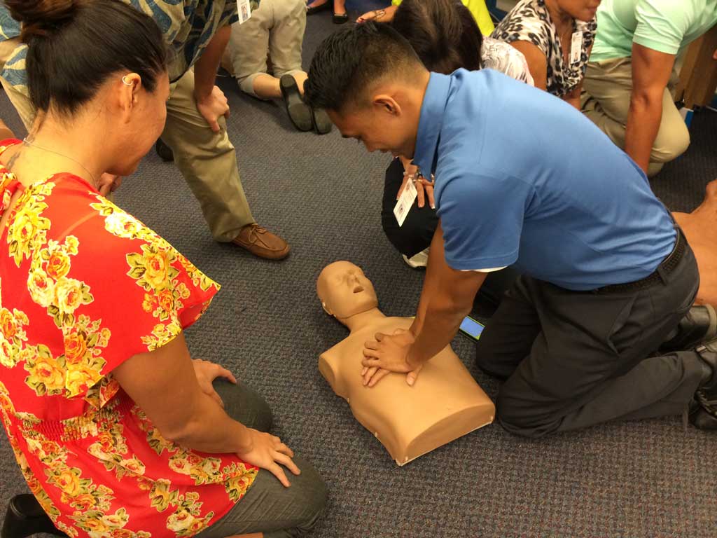 cpr performed on dummy during instructional class