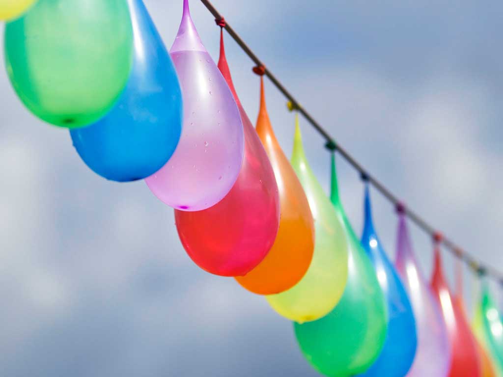 colorful water balloons hung up