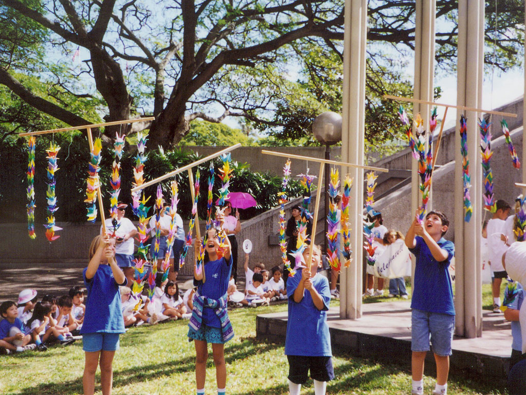 kids with paper cranes