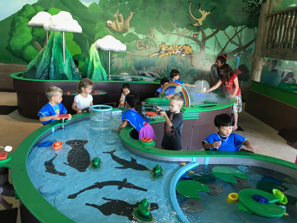 children interacting with the exhibits at Children’s Discovery Center