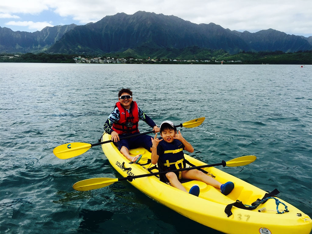parent and child kayaking