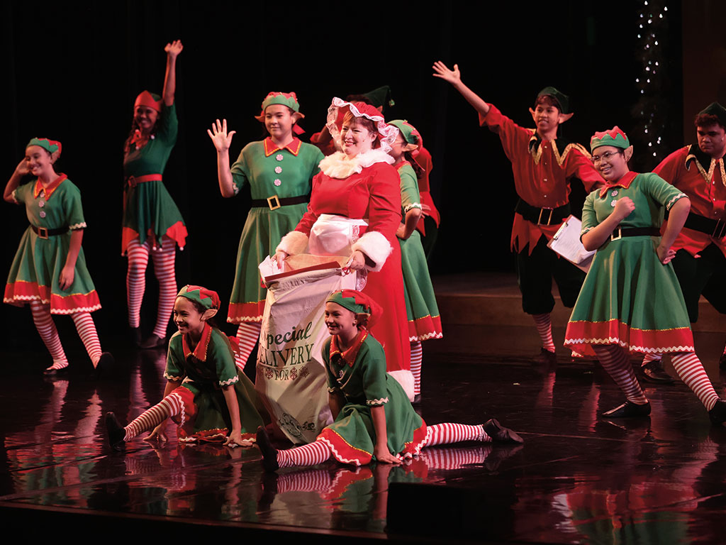 students participating in a holiday theatre performance