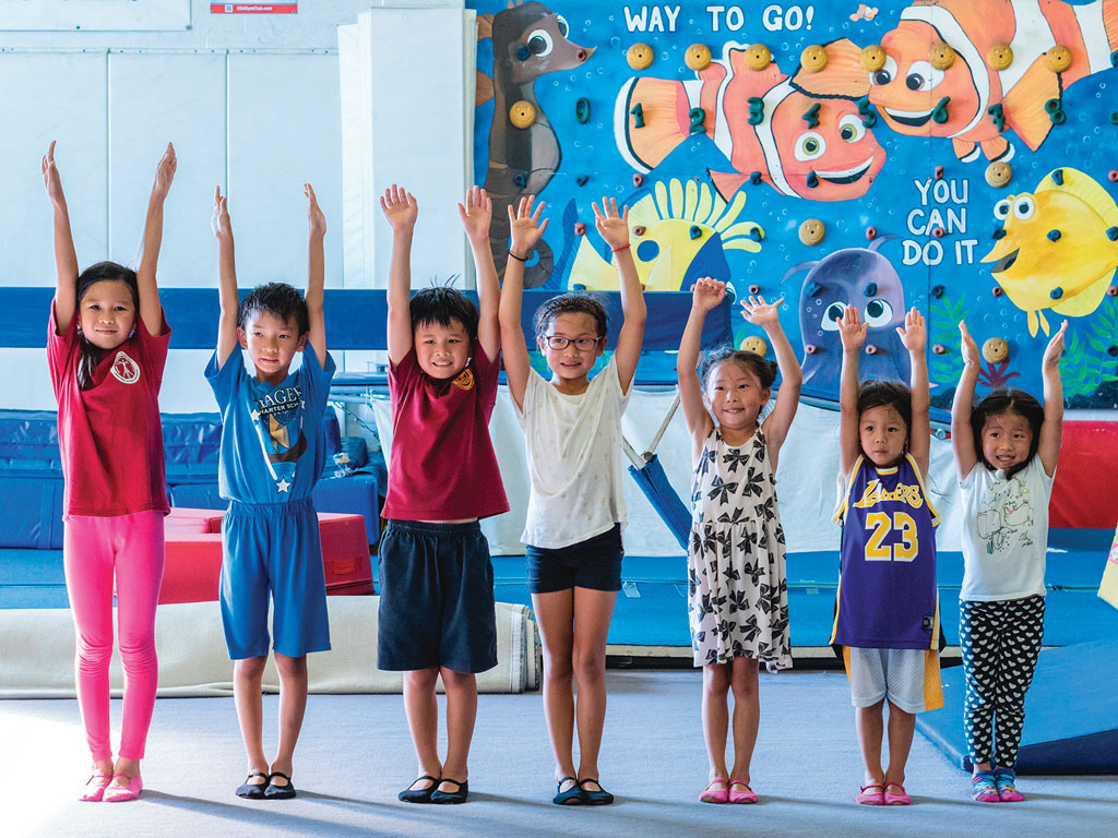 kids practicing gymnastics at Hawaii Academy