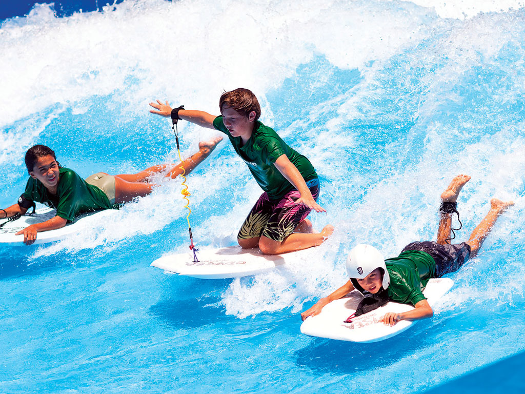 kids surfing at Wai Kai Lineup