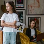 angry daughter ignoring her mother