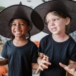 siblings dressed up as witches