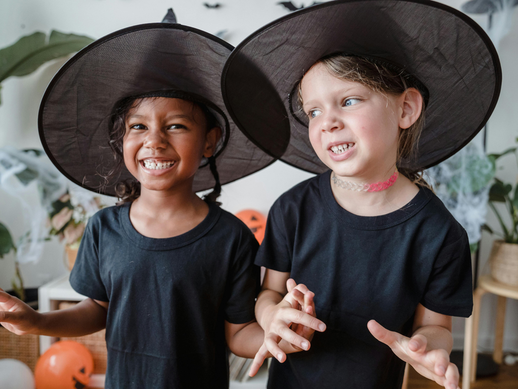 siblings dressed up as witches