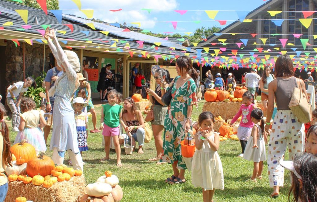families participating in The Great Pumpkin Festival at Holy Nativity School