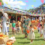 families participating in The Great Pumpkin Festival at Holy Nativity School