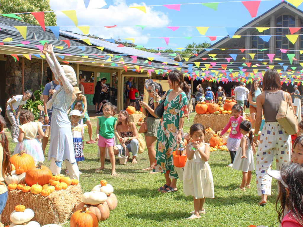 families participating in The Great Pumpkin Festival at Holy Nativity School