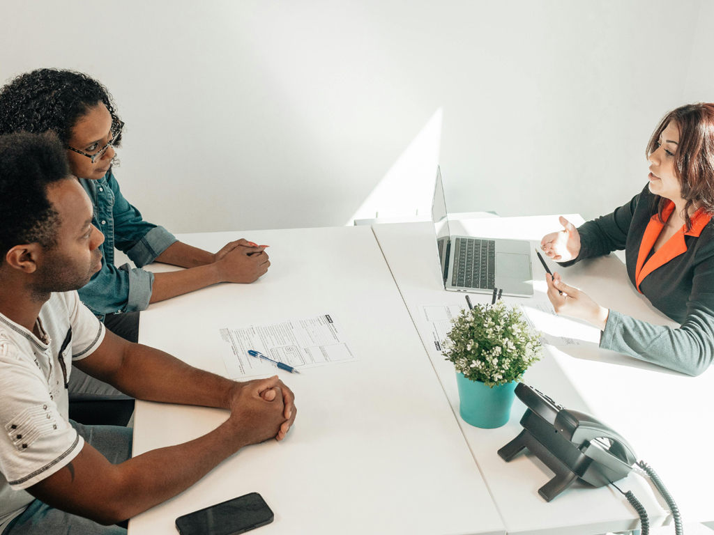 parents talking to a financial advisor
