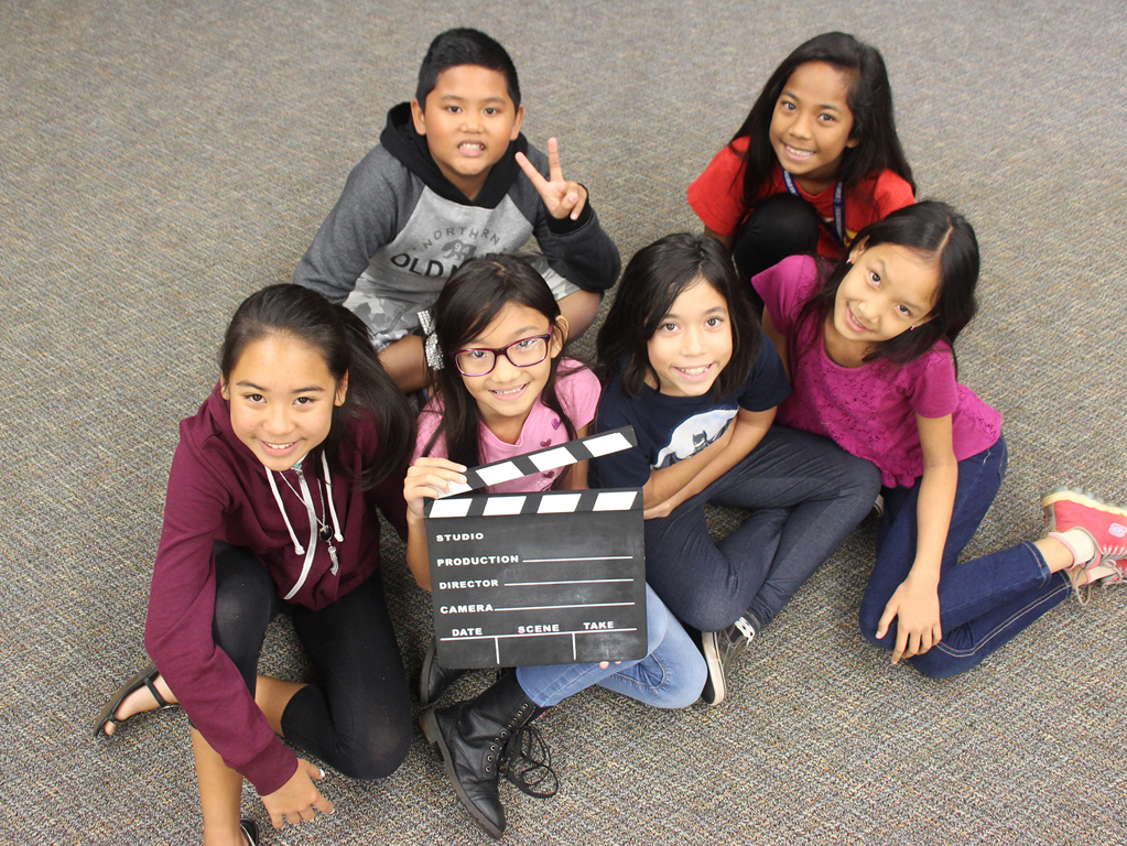 students learning videography skills