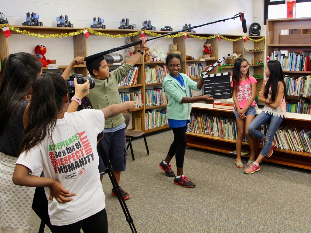 students learning videography skills