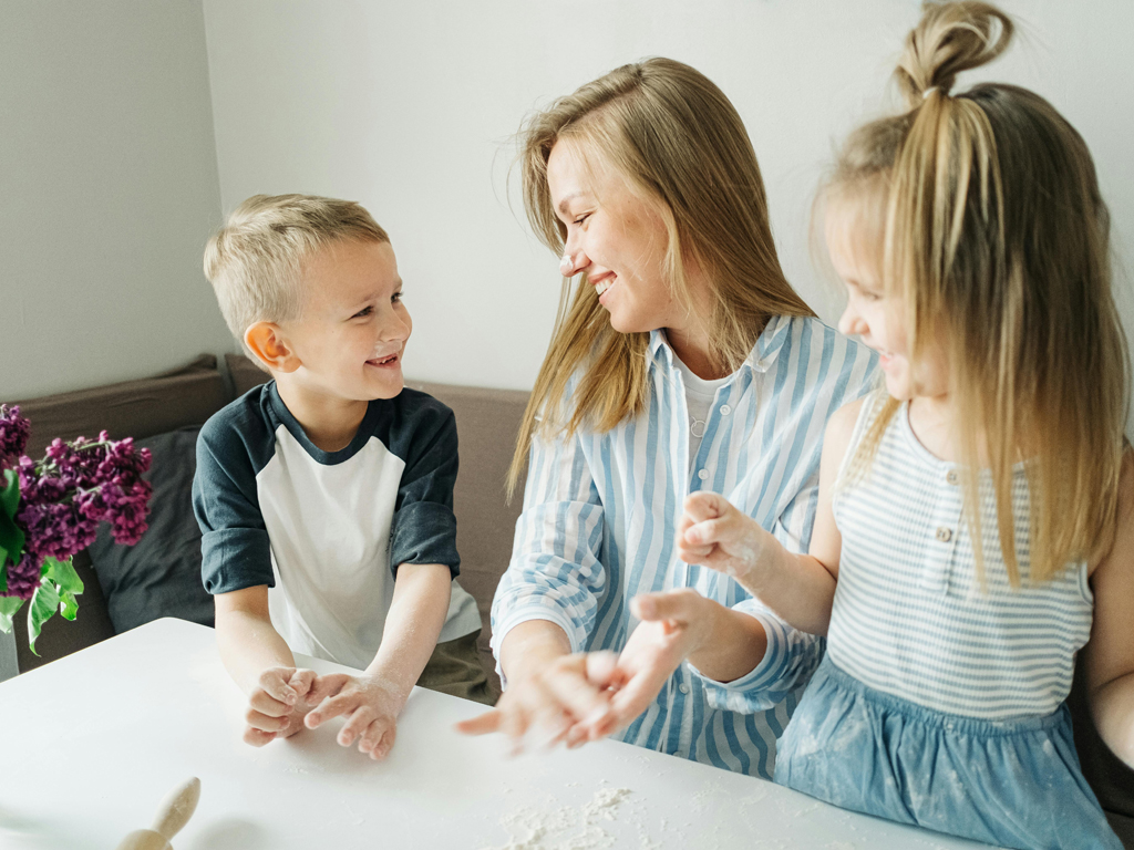 mom having fun with her two kids