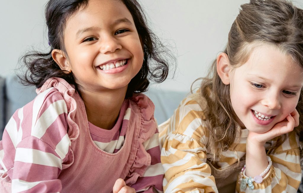 two girls laughing