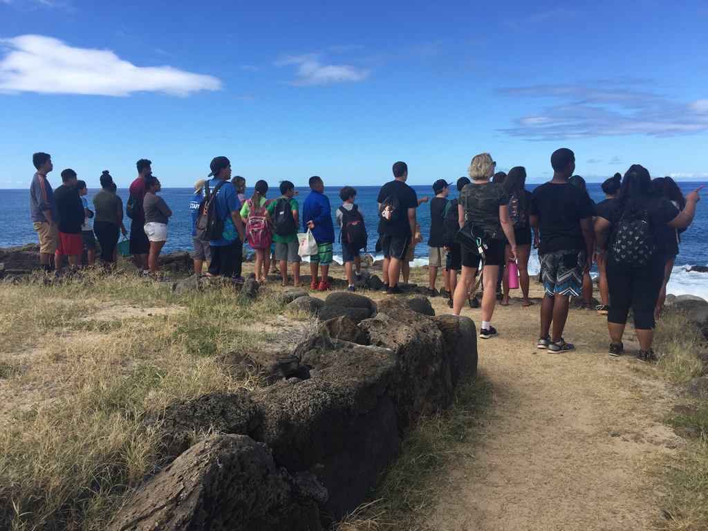 teens looking out to sea