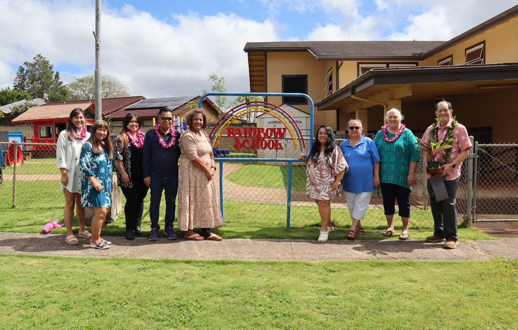 apprentice carpenters with Rainbow Schools staff