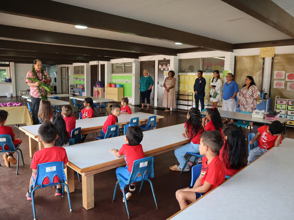 preschool students at Rainbow Schools watching a presentation