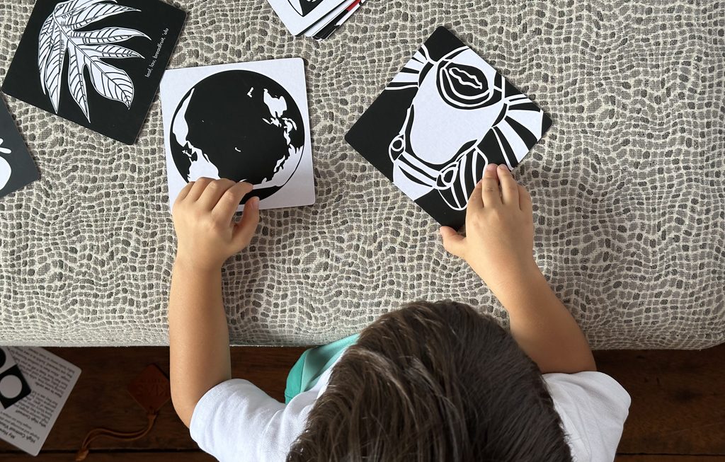 child learning through High Contrast Cards