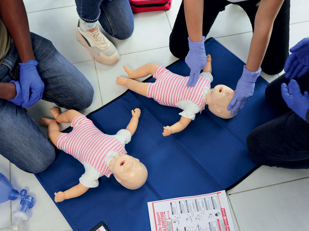 participants learning in a baby cpr class