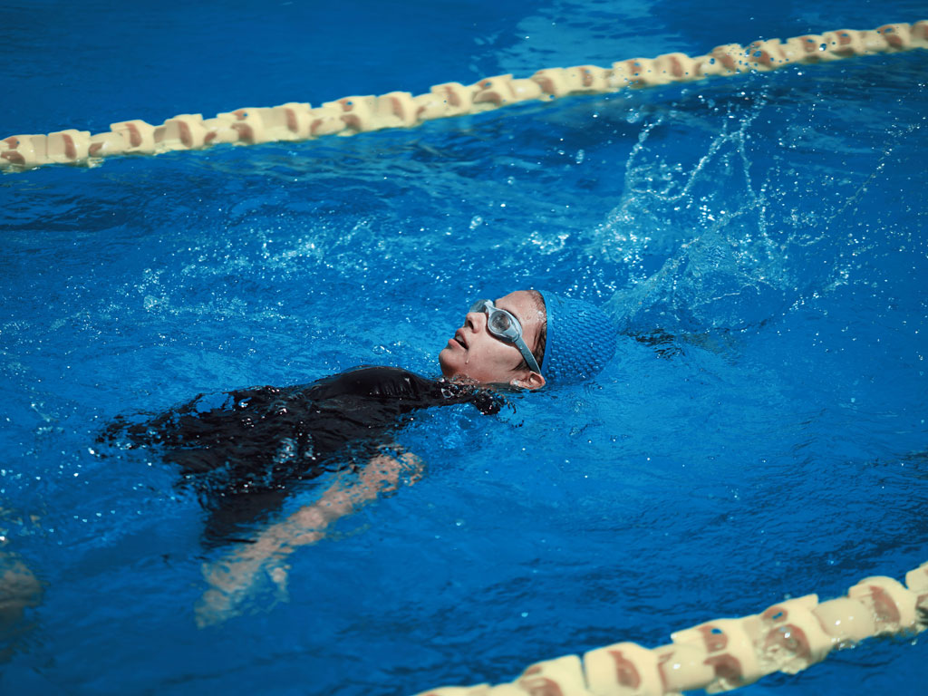 girl swimming in a pool