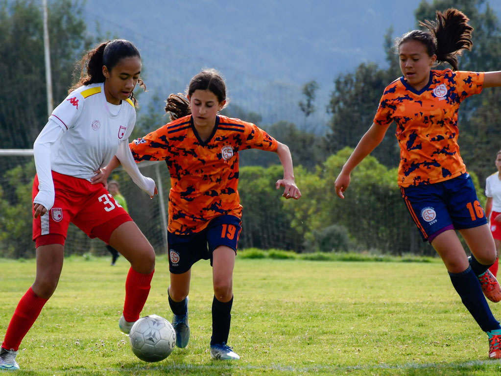 girls playing soccer