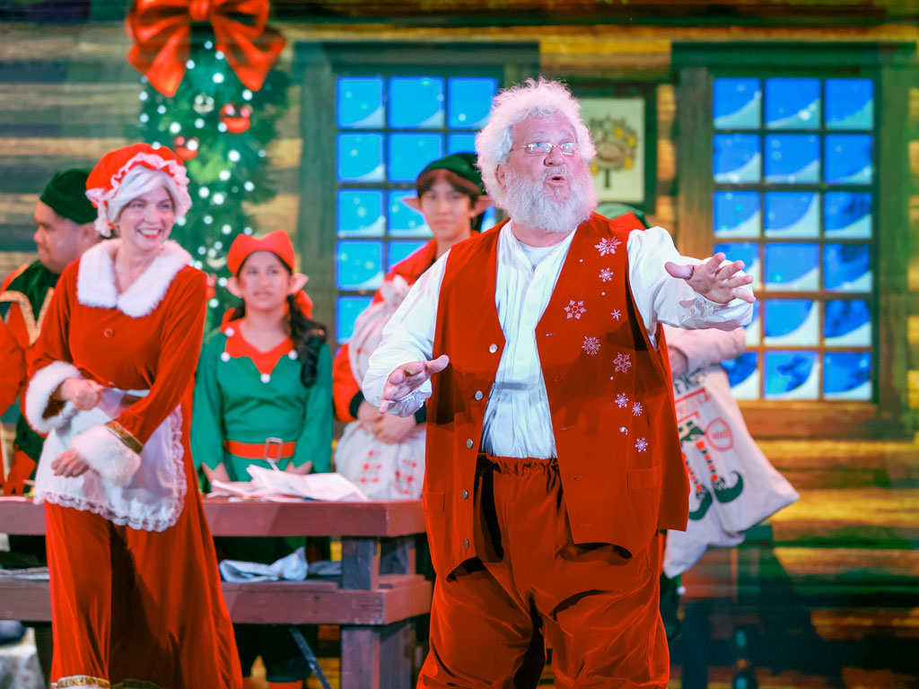 Santa and Mrs. Claus in the Holiday Musical at Moolelo