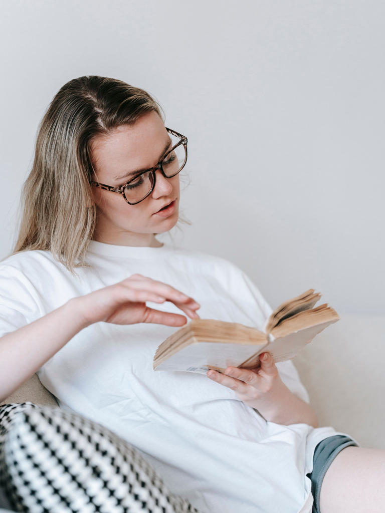 female reading a book
